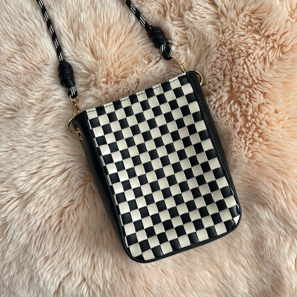 New without tags, this cute checkered purse from target black and cream color